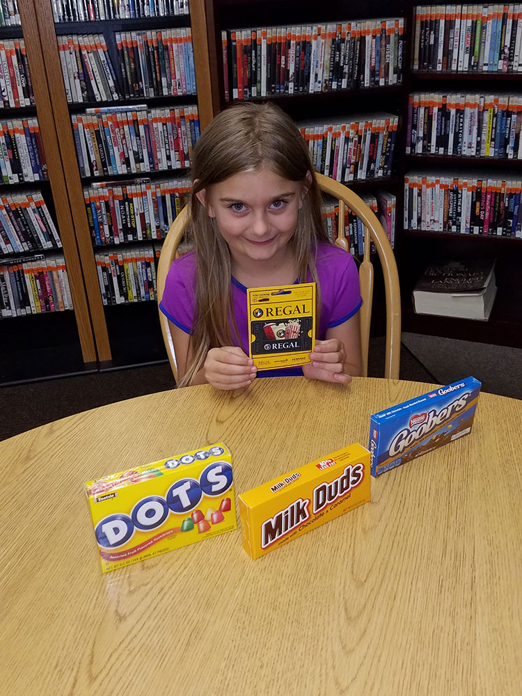 Second Tween Winner, Amelia, with her Barnes & Noble gift card and snacks